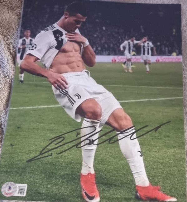 CRISTIANO RONALDO SIGNED REAL MADRID 8X10 PHOTO BECKETT COA